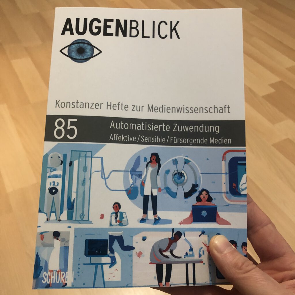 The image shows the cover of a special issue of the German scientific journal "Augenblick. Konstanzer Hefte zur Medienwissenschaft". The special issue's titlöe is "Automatisierte Zuwendung. Affektive/Sensible/Fürsorgende Medien". The cover features an cartoonish image showing different people operating different technical devices.